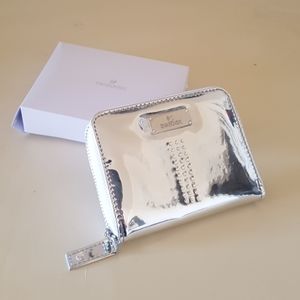 Brand new in the box Swarovski wallet.